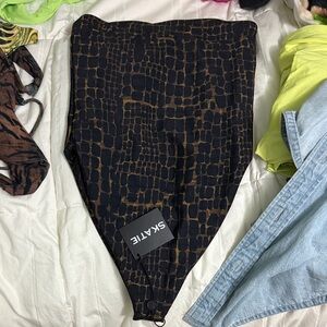 ISO Skatie Amy One Piece- Cadillac size medium